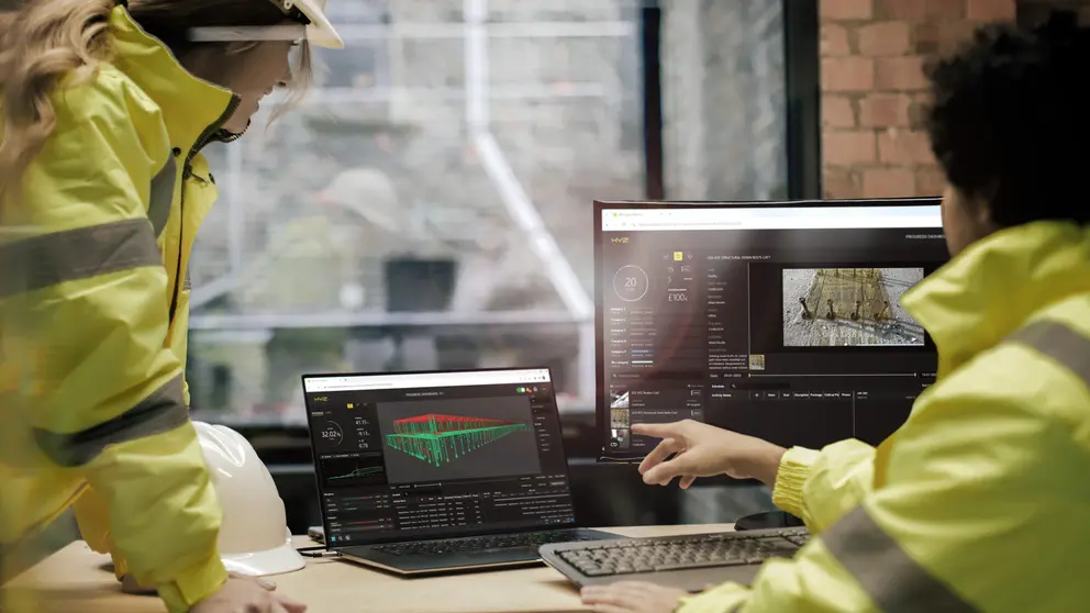 image of PetroqonyX  logo and men in front of multiple screens